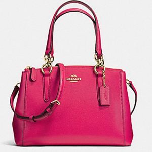 Coach mini Christie carry all in Crossgrain leather color pink Ruby.